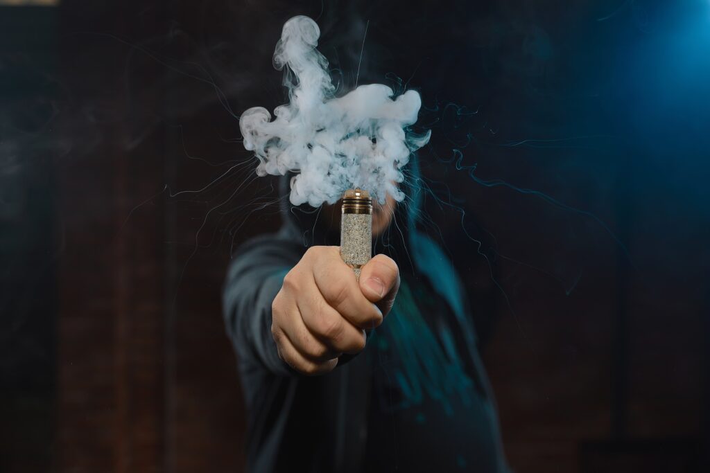 dripper-in-one-hand-making-a-cloud-of-fume-2024-10-19-15-12-24-utc-min