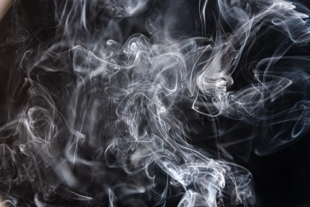 white-abstract-shaped-smoke-against-black-backgrou-2024-10-16-02-15-00-utc